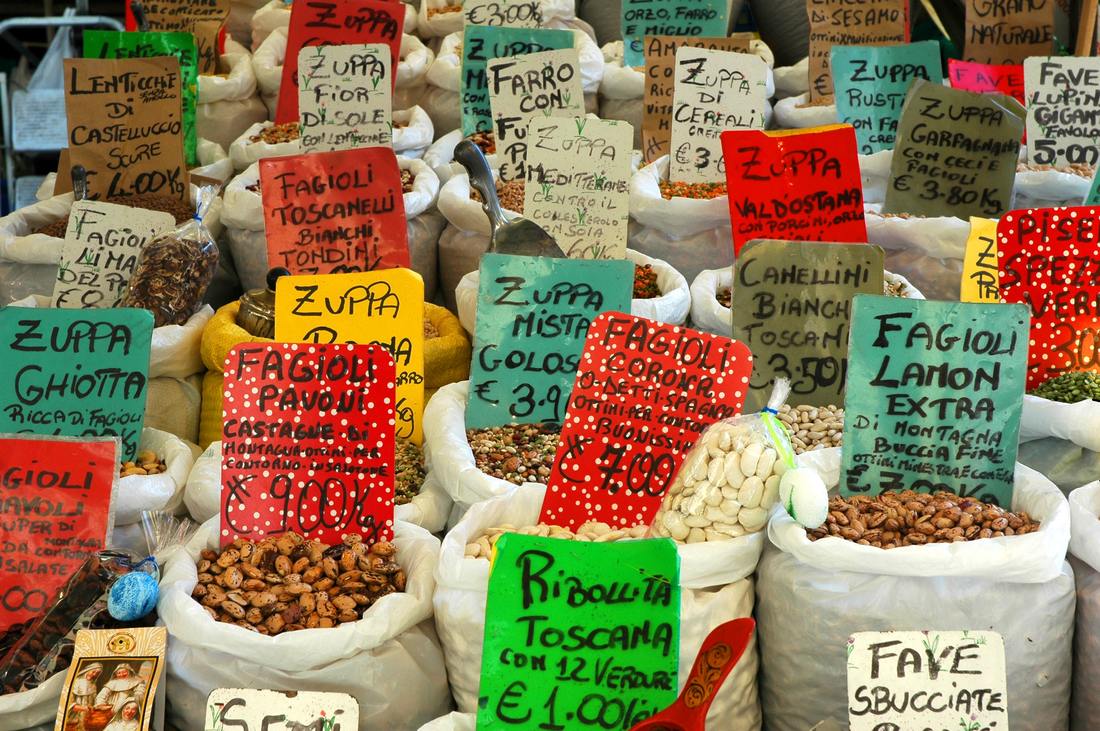 Bags of beans at market with Italian price tags