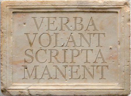 Latin proverb inscription verba volant scripta manent on marble